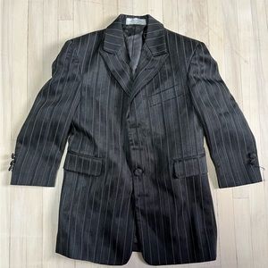 Size 4. Three piece Pinstriped Suit. From Italy.